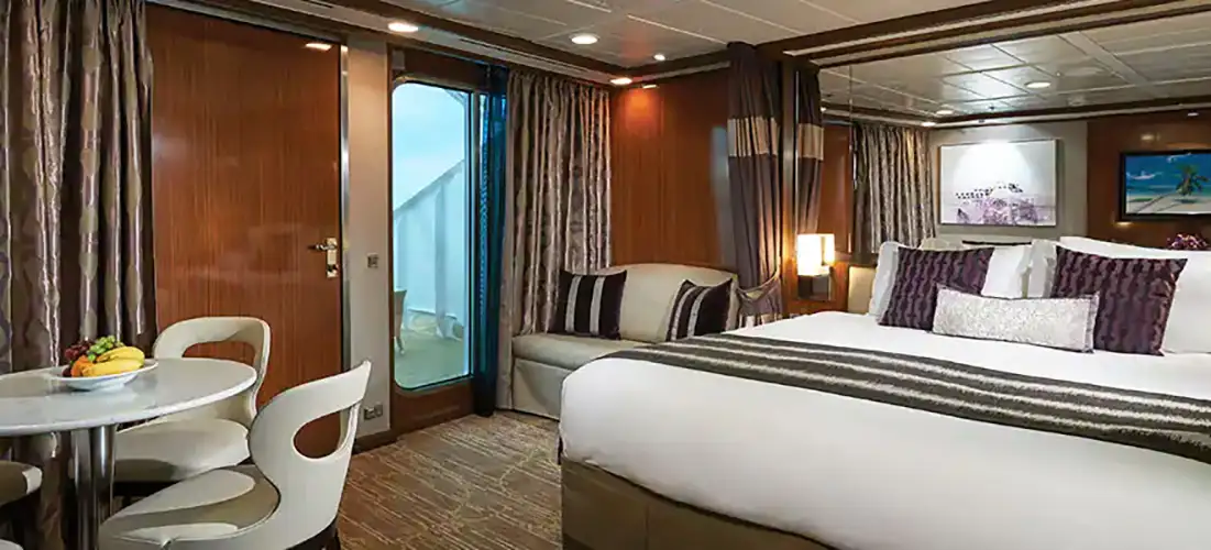 Forward-facing deluxe penthouse with large balcony norwegian-cruise-line-norwegian-gem-sd.webp